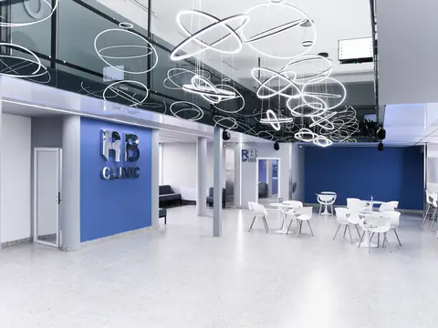 Холл RB CLINIC: световые кольца под потолком и белые столики